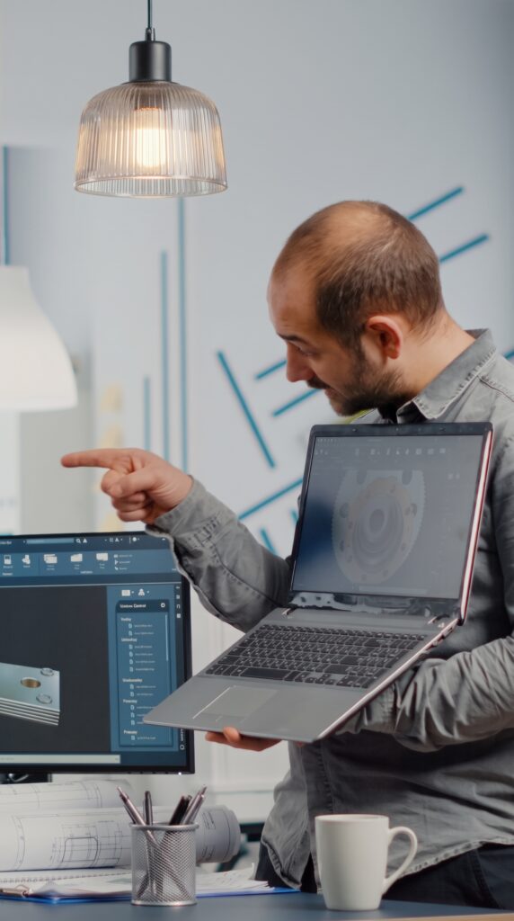 man project supervisor holding laptop pointing display &raquo; %sitename -% &raquo; 2026